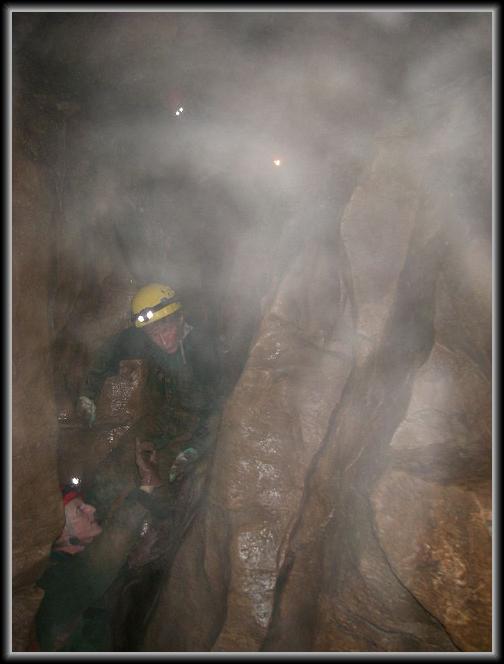 kee-6.JPG - Alan helps a caver navigate a down climb.