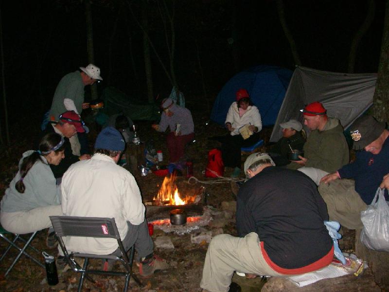 shawnee-43.JPG - Eating dinner around the fire.  It was chilly!